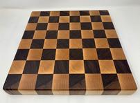 Handmade wooden cutting board or chess board made of walnut and maple. 202//149